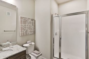a bathroom with a shower and a sink and a toilet  at Aventura at Hawk Ridge, Lake St Louis, MO, 63367